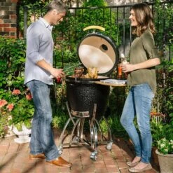 Coyote Ceramic Asado Smoker With Wheeled Stand & Side Shelves (C1CHCS-FS) -Weber Store c1chcs fs d 07 21